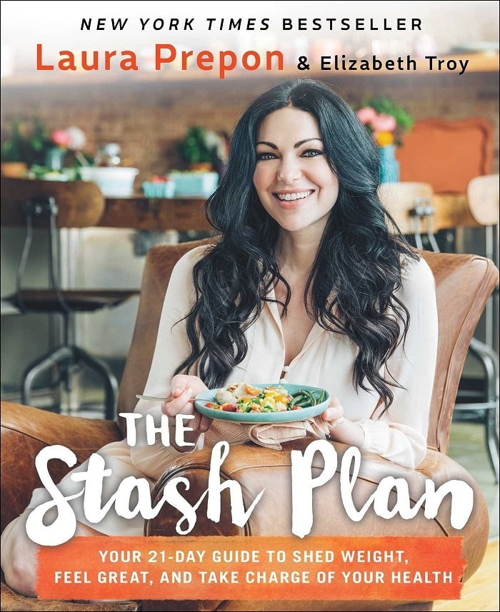 Laura Prepon promoting her cookbook while holding dish in her hand